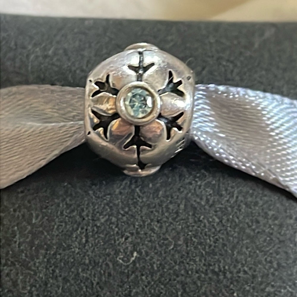 Pandora retired blue topaz snowflake
